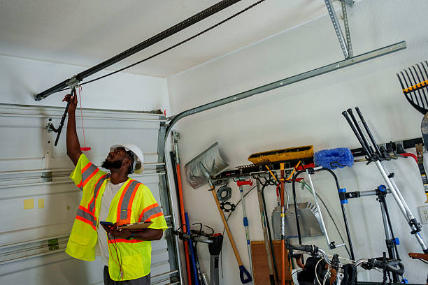 Professional Garage Door Installation technician working in Carbondale, PA